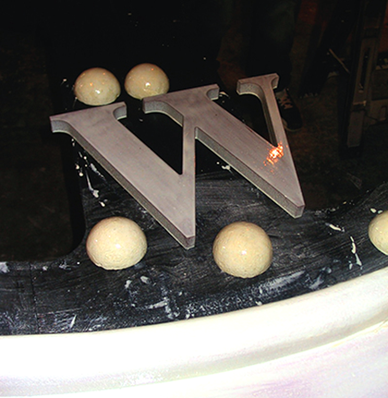 spanish-galleon-reconstruction,-by-john-rivera-resto,-2012,-applying-styrospray-to-letters