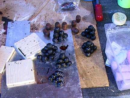 spanish-galleon-reconstruction,-by-john-rivera-resto,-2012,-constructing-cannon-ball-stack,-cannon-port-doors-and-powder-barrels