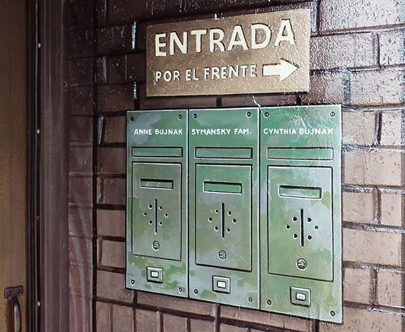 sign and mailboxes