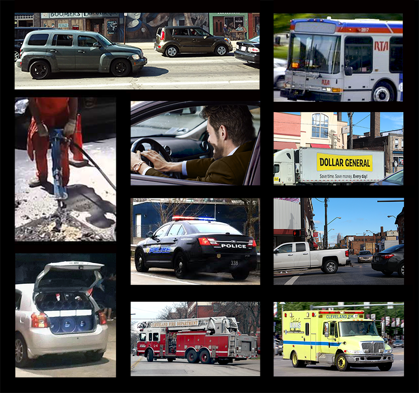 detail of john wearing ear mufflers while painting