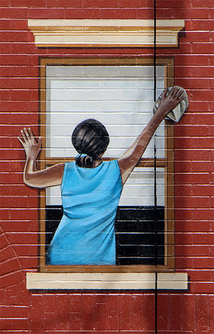 lady cleaning window