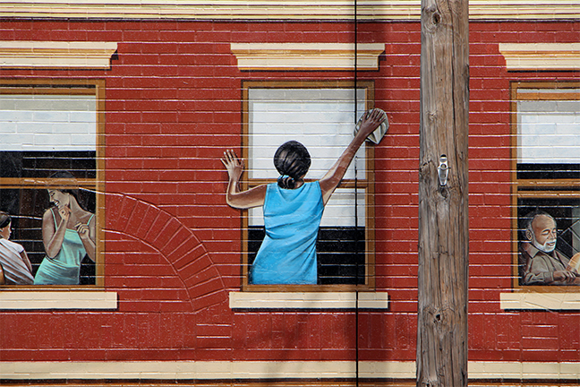 lady cleaning window