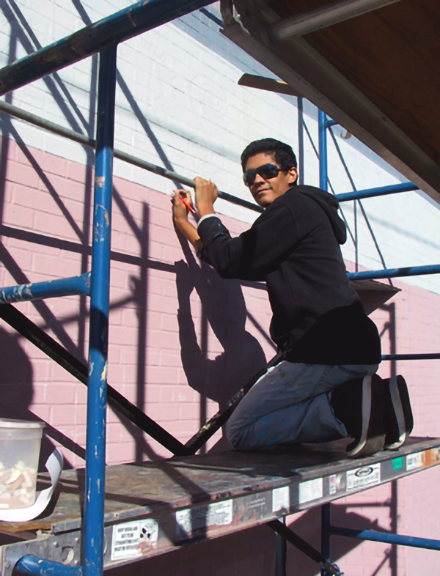 josh retracing chalklines with pencil