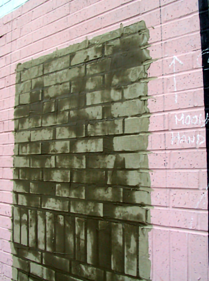 concrete mix rendering drying on the wall