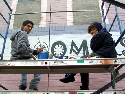 josh and amanda painting discotech sign