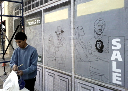 inked figures on display windows of building 1