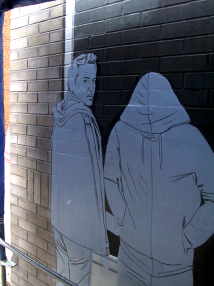 view of heatlamp and storage box inside the makeshift shelter