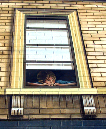 image of a lonely boy looking down from the window