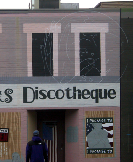 inked drawing of a hand reaching for the moon