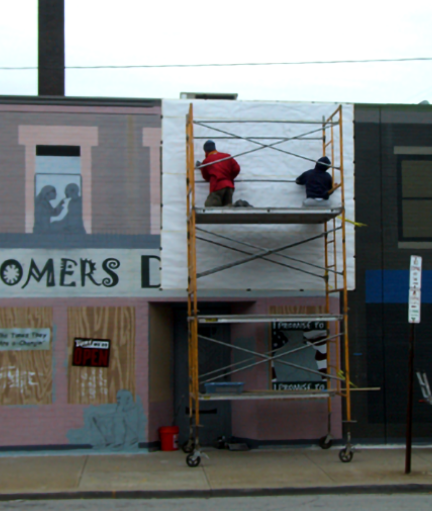 large paper layout positioned and secured to the wall