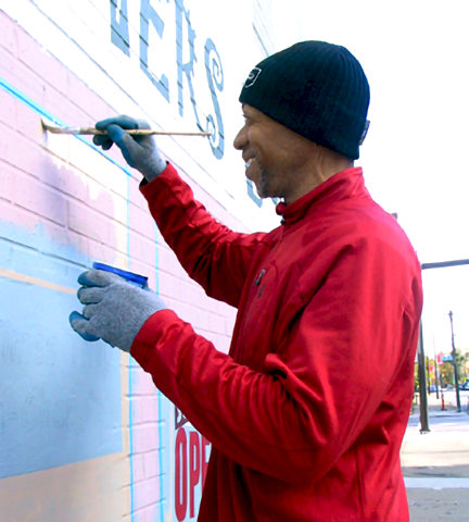 ric owens painting and smiling
