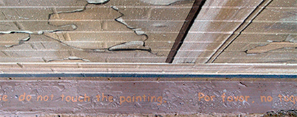 inscription on the side walk: please do not touch the painting