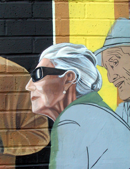 painting the face of the elderly lady