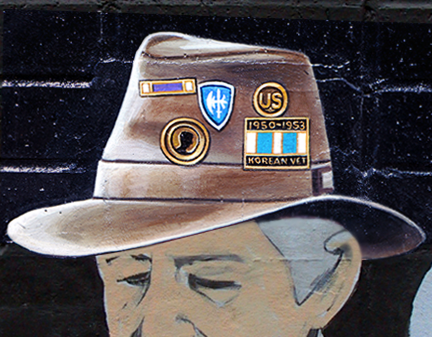 close up detail of the veteran's hat