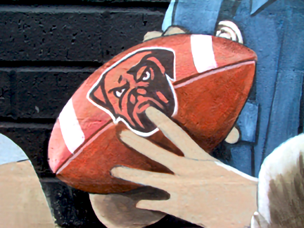 detail of cleveland browns football with dog emblem