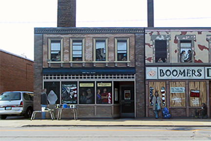 painting the last two figures on the mural